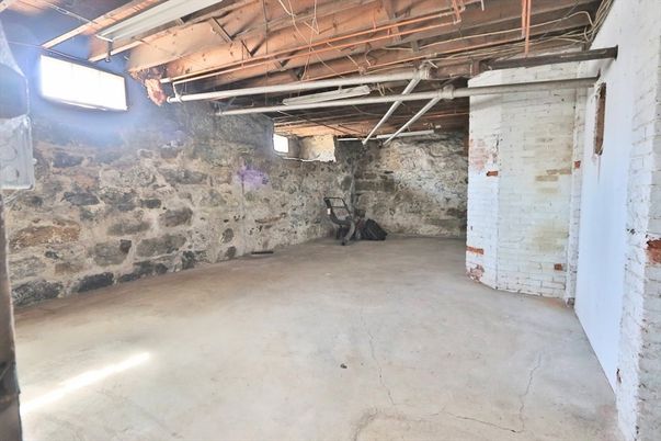 Garage, Interior, Stone Walls, Wooden Beams