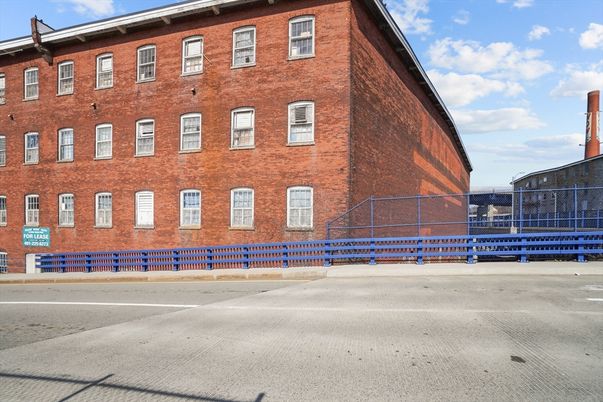 Exterior, Facade, Brick Facade, Condo Building