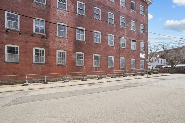 Exterior, Facade, Brick Facade, Condo Building