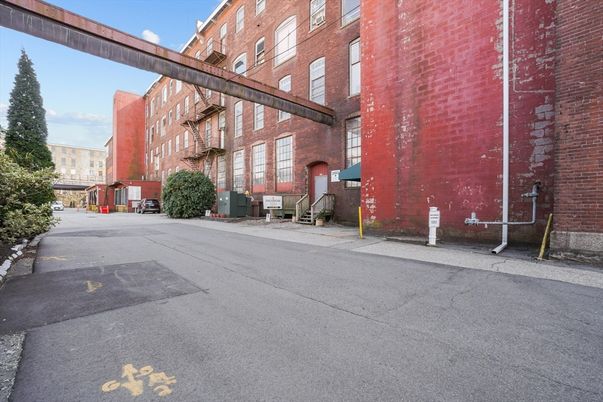 Exterior, Facade, Brick Facade, Condo Building