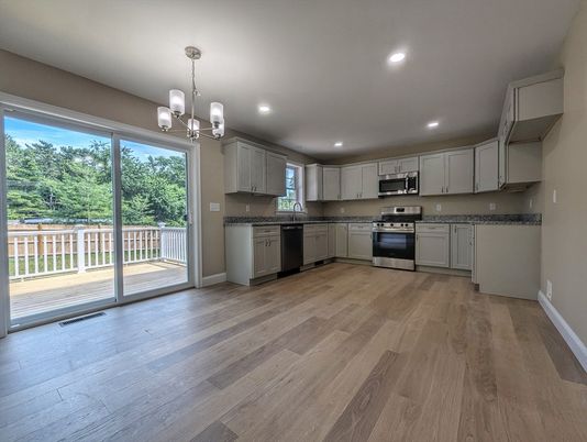 Chandelier, Interior, Kitchen, Pendant Lights, Recessed Lighting, Stainless Steel Appliances, Wood Texture Flooring