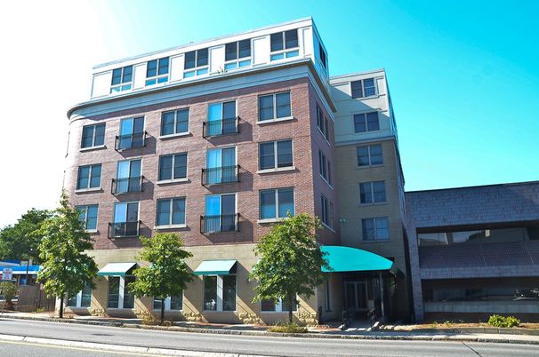 Exterior, Facade, Brick Facade, Condo Building