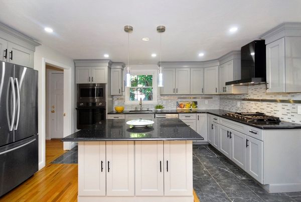 Interior, Kitchen, Marble, Pendant Lights, Recessed Lighting, Stainless Steel Appliances, Wood Texture Flooring