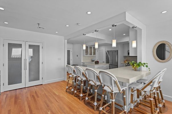 Dining room, Interior, Kitchen, Pendant Lights, Recessed Lighting, Stainless Steel Appliances, Wood Texture Flooring