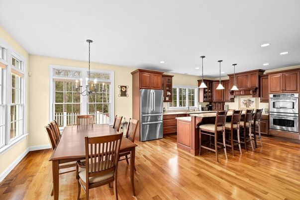 Dining room, Interior, Kitchen, Pendant Lights, Recessed Lighting, Stainless Steel Appliances, Wood Texture Flooring