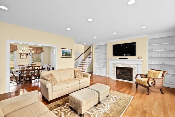 Chandelier, Dining room, Fireplace, Interior, Living room, Recessed Lighting, Wood Texture Flooring