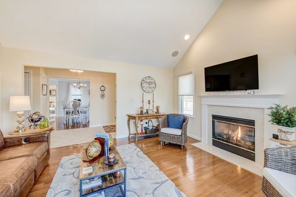 Chandelier, Dining room, Fireplace, Interior, Living room, Recessed Lighting, Wood Texture Flooring