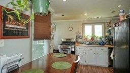 Dining room, Interior, Kitchen, Recessed Lighting, Stainless Steel Appliances, Wood Texture Flooring