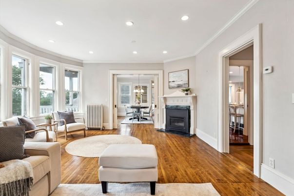 Dining room, Fireplace, Interior, Living room, Recessed Lighting, Wood Texture Flooring