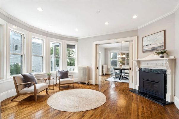 Dining room, Fireplace, Interior, Living room, Pendant Lights, Recessed Lighting, Wood Texture Flooring