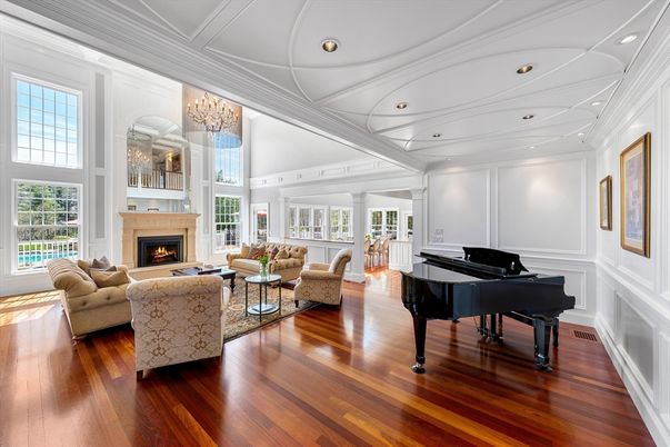 Chandelier, Fireplace, Interior, Living room, Piano, Recessed Lighting, Wood Texture Flooring