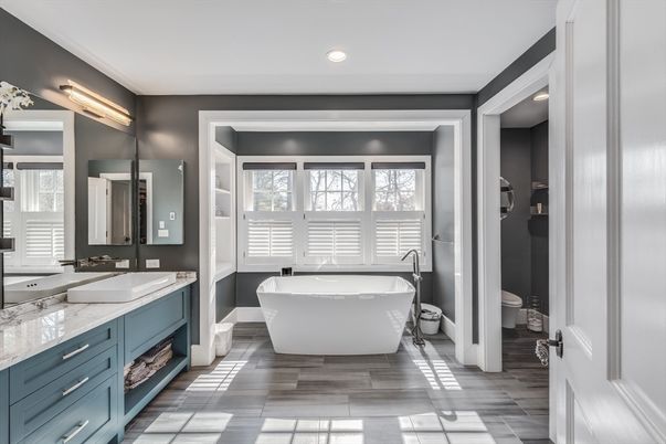 Bathroom, Dual Sink Vanities, Free Standing Baths, Interior, Recessed Lighting, Wood Texture Flooring