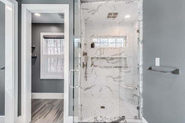 Bathroom, Glass Shower, Interior, Marble Walls, Recessed Lighting, Wood Texture Flooring