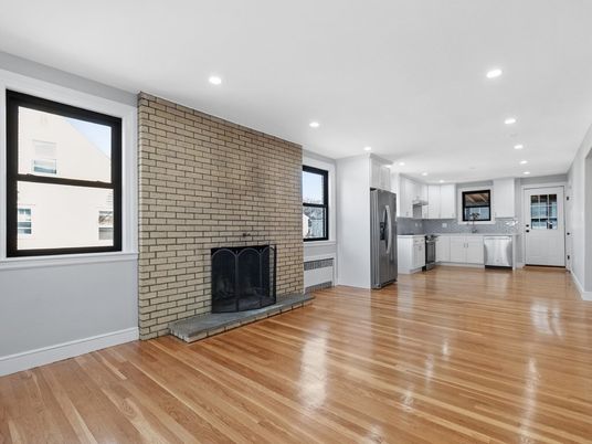 Fireplace, Interior, Kitchen, Recessed Lighting, Stainless Steel Appliances, Stone Walls, Wood Texture Flooring