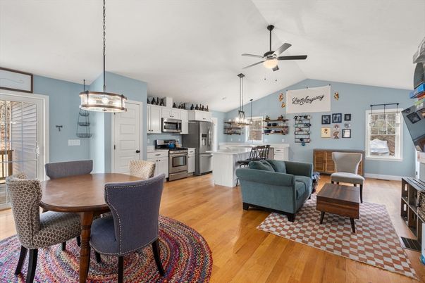 Chandelier, Dining room, Interior, Kitchen, Living room, Pendant Lights, Stainless Steel Appliances, Wood Texture Flooring
