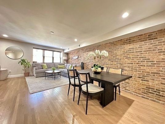 Dining room, Interior, Living room, Recessed Lighting, Stone Walls, Wood Texture Flooring