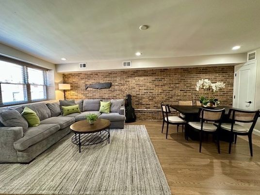 Dining room, Interior, Living room, Recessed Lighting, Stone Walls, Wood Texture Flooring