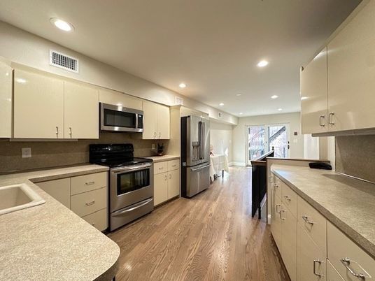 Interior, Kitchen, Recessed Lighting, Stainless Steel Appliances, Wood Texture Flooring