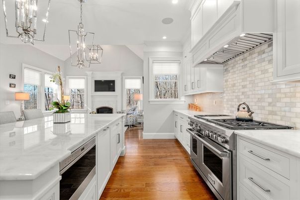 Fireplace, Interior, Kitchen, Living room, Pendant Lights, Recessed Lighting, Stainless Steel Appliances, Wood Texture Flooring