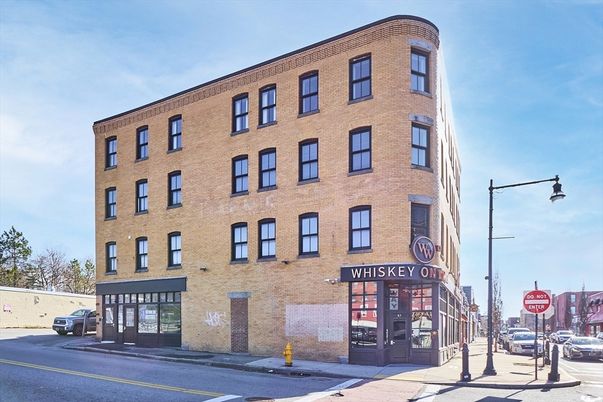 Exterior, Facade, Brick Facade, Condo Building