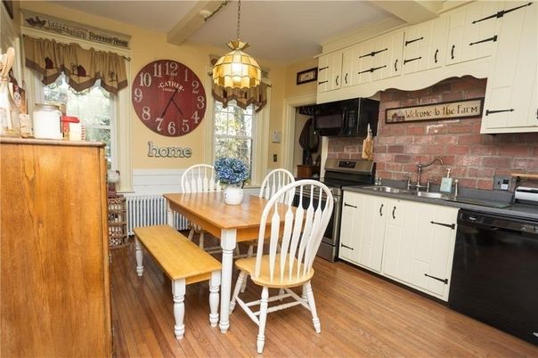 Dining room, Interior, Kitchen, Pendant Lights, Stainless Steel Appliances, Wood Texture Flooring