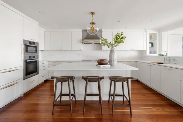 Interior, Kitchen, Marble Walls, Recessed Lighting, Stainless Steel Appliances, Wood Texture Flooring