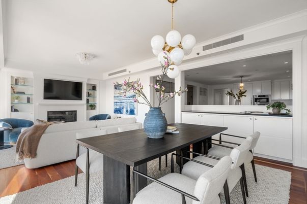 Dining room, Fireplace, Interior, Kitchen, Living room, Pendant Lights, Recessed Lighting, Stainless Steel Appliances, Wood Texture Flooring