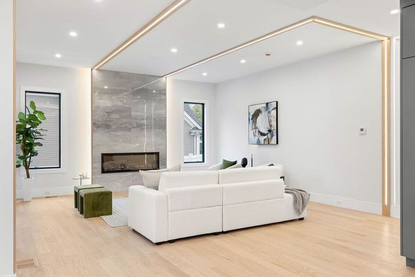 Fireplace, Interior, Living room, Marble Walls, Recessed Lighting, Wood Texture Flooring
