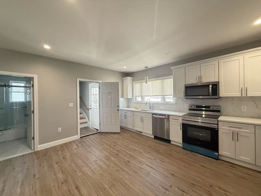 Interior, Kitchen, Recessed Lighting, Stainless Steel Appliances, Wood Texture Flooring