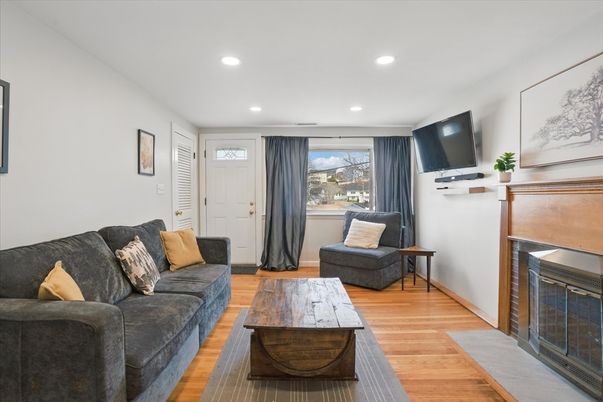 Fireplace, Interior, Living room, Recessed Lighting, Wood Texture Flooring