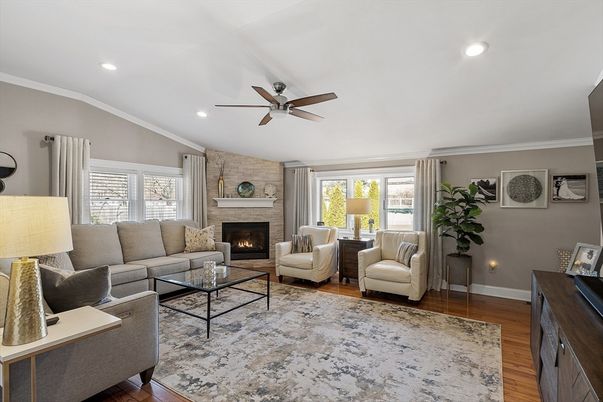 Fireplace, Interior, Living room, Recessed Lighting, Stone Walls, Wood Texture Flooring