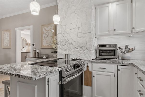 Interior, Kitchen, Pendant Lights, Stainless Steel Appliances, Stone Walls