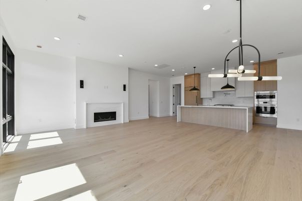Fireplace, Interior, Kitchen, Pendant Lights, Recessed Lighting, Stainless Steel Appliances, Wood Texture Flooring