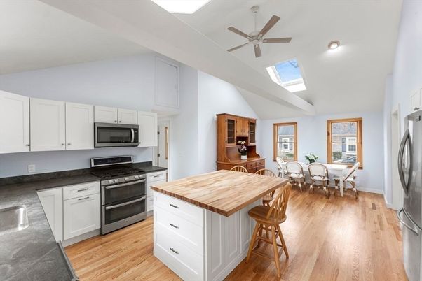 Dining room, Interior, Kitchen, Recessed Lighting, Stainless Steel Appliances, Wood Texture Flooring