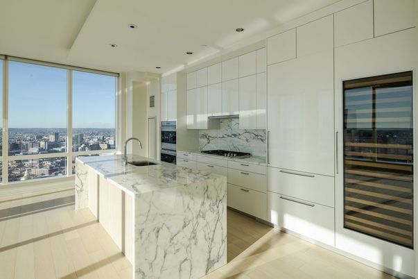 Interior, Kitchen, Marble Walls, Recessed Lighting, Stainless Steel Appliances, Wood Texture Flooring