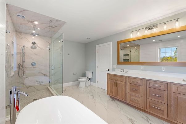 Bathroom, Dual Sink Vanities, Free Standing Baths, Glass Shower, Interior, Marble, Marble Walls, Recessed Lighting