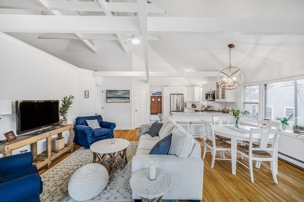 Chandelier, Dining room, Interior, Kitchen, Living room, Pendant Lights, Stainless Steel Appliances, Wood Texture Flooring