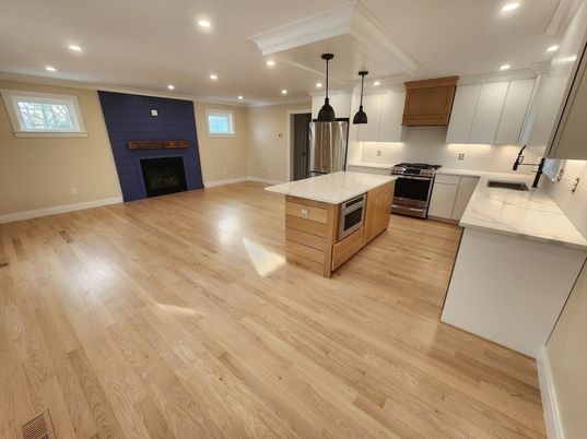 Fireplace, Interior, Kitchen, Pendant Lights, Recessed Lighting, Stainless Steel Appliances, Wood Texture Flooring