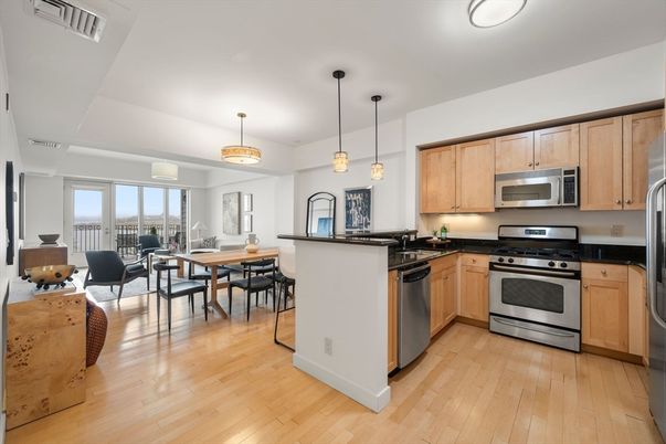 Dining room, Interior, Kitchen, Pendant Lights, Stainless Steel Appliances, Wood Texture Flooring