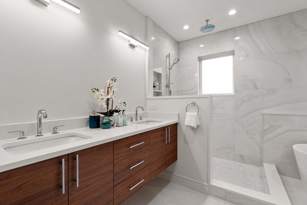 Bathroom, Dual Sink Vanities, Glass Shower, Interior, Marble Walls, Recessed Lighting