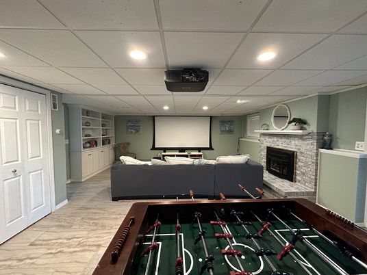 Fireplace, Game Room, Interior, Living room, Projection Screen, Recessed Lighting