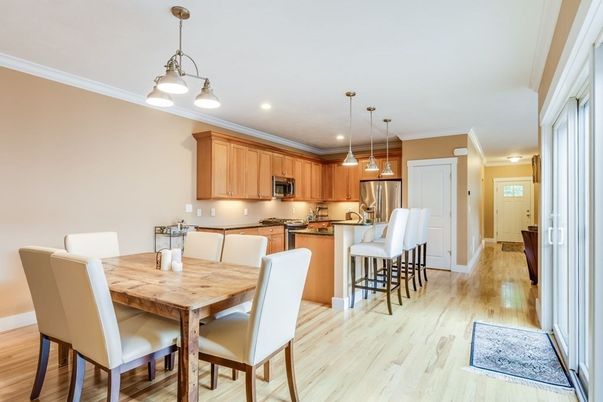 Dining room, Interior, Kitchen, Pendant Lights, Recessed Lighting, Stainless Steel Appliances, Wood Texture Flooring