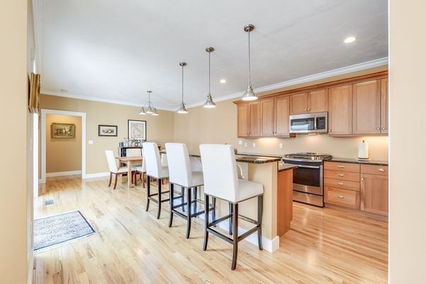 Dining room, Interior, Kitchen, Pendant Lights, Recessed Lighting, Stainless Steel Appliances, Wood Texture Flooring