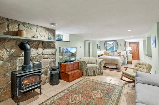 Bedroom, Fireplace, Interior, Recessed Lighting, Stone Walls