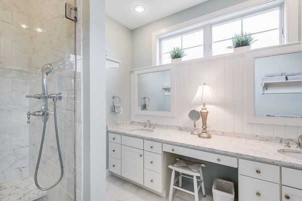 Bathroom, Dual Sink Vanities, Glass Shower, Interior, Marble, Marble Walls, Recessed Lighting