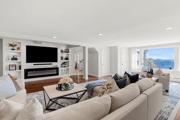 Fireplace, Interior, Living room, Recessed Lighting, Water, Wood Texture Flooring