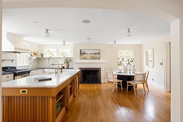 Dining room, Fireplace, Interior, Kitchen, Stainless Steel Appliances, Wood Texture Flooring