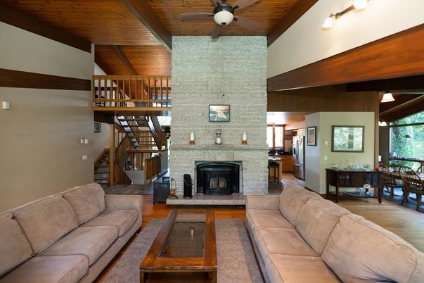Dining room, Fireplace, Interior, Living room, Pendant Lights, Stone Walls, Wooden Beams, Wooden Ceilings, Wood Texture Flooring