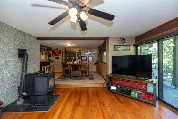 Dining room, Fireplace, Interior, Stone Walls, Wood Texture Flooring