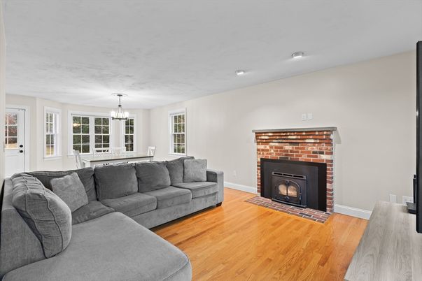Chandelier, Dining room, Fireplace, Interior, Living room, Recessed Lighting, Wood Texture Flooring